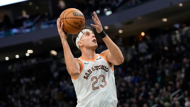 Dec 19, 2023; Milwaukee, Wisconsin, USA; San Antonio Spurs center Zach Collins (23) shoots during the third quarter against the Milwaukee Bucks at Fiserv Forum.
